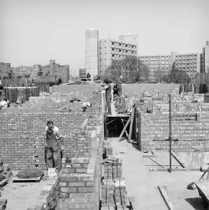 Prints of Royal Scot Hotel, Kings Cross Road, Islington, Greater London. Bricklayers at work building the interior walls of the Royal Scot Hotel during its construction Engineering And Construction Prints: Print of Bricklayers at Work, Royal Scot Hotel Construction