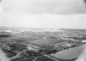 Prints of FORD MOTOR WORKS, BARKING AND DAGENHAM, GREATER LONDON. An aerial view showing progress on the new light structure for the Ford Motor Company Limited at Dagenham Engineering And Construction Prints: Aerial view of Dagenham Ford Motor Works construction, print