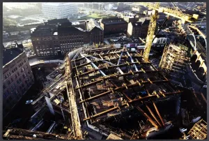 Prints of The Bridgewater Hall, Barbirolli Square, Manchester. An elevated view looking down towards the metal framework of the inner roof structure of the Bridgewater Hall during its construction Engineering And Construction Prints: Print of Elevated View Down Inner Roof Structure JLP01_22_02_055