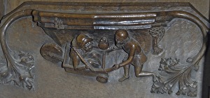 Man pushing woman in wheelbarrow DP033059 Man pushing woman in wheelbarrow DP033059