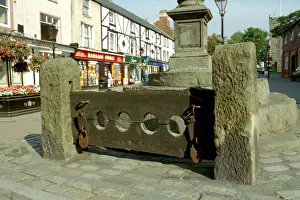 Print of Stone Pillars with Wooden Stock Beams