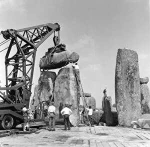 Pre Historic Collection: Stonehenge. Re-erection of Trilithon lintel in 1958 P50217