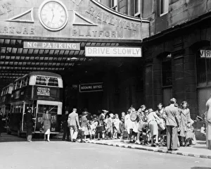 Evacuees waiting outside the departure platform at Paddington in 1939 Evacuees waiting outside the departure platform at Paddington in 1939