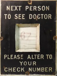 Steam Museum Exhibits UK Prints: Patient number board from Swindon Medical Fund waiting room