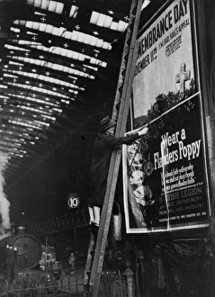 Woman pasting a billboard poster at Paddington station, 1943 Woman pasting a billboard poster at Paddington station, 1943
