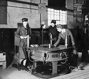 Women war workers making ammunition shells in 24F Shop, 1943. Women war workers making ammunition shells in 24F Shop, 1943.