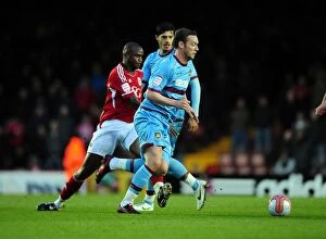 Images Dated 17th April 2012: Bristol City vs. West Ham: Intense Battle Between Kalifa Cisse and Kevin Nolan