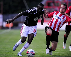 Bristol Citys Albert Adomah is fouled by Ryan Harley Bristol Citys Albert Adomah is fouled by Ryan Harley