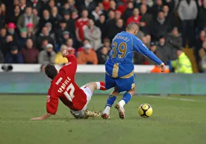 Ivan Sproule challenges portsmouth left back Nadir Belhadj Ivan Sproule challenges portsmouth left back Nadir Belhadj