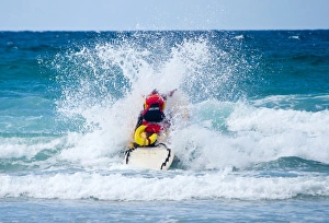 Lifeguard on a rescue watercraft at Watergate Bay Lifeguard on a rescue watercraft at Watergate Bay