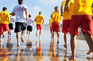 Lifeguards up early for a mornings training session on Perranporth beach Lifeguards up early for a mornings training session on Perranporth beach