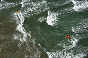 Lifeguards on a rescue watercraft (RWC) and arancia inshore rescue boat shot Lifeguards on a rescue watercraft (RWC) and arancia inshore rescue boat shot