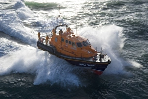 Padstow Tamar class lifeboat Spirit of Padstow 16-04. Lifeboat is heading from left to right in choppy seas Padstow Tamar class lifeboat Spirit of Padstow 16-04. Lifeboat is heading from left to right in choppy seas