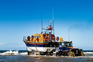 Rhyl Mersey class lifeboat Lil Cunningham 12-24 being launched by tractor Rhyl Mersey class lifeboat Lil Cunningham 12-24 being launched by tractor