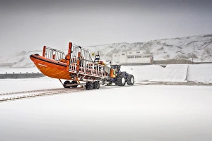 Sheringham Atlantic 85 inshore lifeboat The Oddfellows B-818 on a launching trailer on the beach Sheringham Atlantic 85 inshore lifeboat The Oddfellows B-818 on a launching trailer on the beach