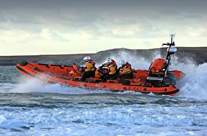 Trearddur Bay Atlantic 85 inshore lifeboat Hereford Endeavour B-847. Lifeboat moving from right to left at speed Trearddur Bay Atlantic 85 inshore lifeboat Hereford Endeavour B-847. Lifeboat moving from right to left at speed