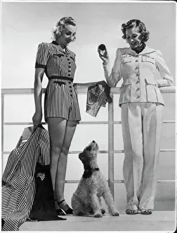 <b class=qtipBold><figcaption>1930S Playsuits</figcaption></b><br>Striped playsuit with shorts with matching 3/4 length coat or a linen suit with trousers & jacket with large patch pockets. A wire-haired fox terrier sits nearby.<br><em>© Mary Evans Picture Library 2015 - https://copyrighthub.org/s0/hub1/creation/maryevans/MaryEvansPictureID/10144354</em> 1930S Playsuits