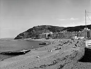 Prints of View of the beach and seafront at the popular Mid Wales seaside resort of Aberystwyth, Ceredigion. Date: 1950s Cardigan Prints: Aberystwyth 1950s Print - Mid Wales Seaside Resort
