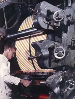 A Print Machine Receives Red Dye