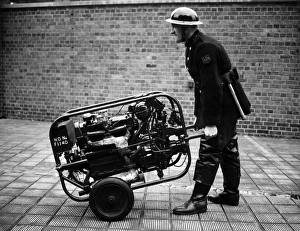 AFS worker with emergency appliance, WW2 AFS worker with emergency appliance, WW2