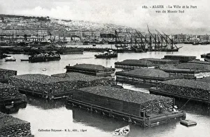 Algiers, Algeria - Quarried stone on floating barges in the harbour, awaiting export Algiers, Algeria - Quarried stone on floating barges in the harbour, awaiting export