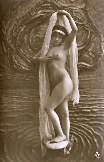 Artistic Italian nude standing amid stylised watery backdrop Artistic Italian nude standing amid stylised watery backdrop