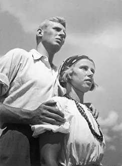 Aryan Types Print, a strong couple standing together