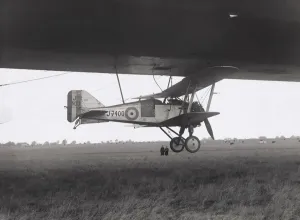 Prints of Royal Aircraft Establishment Rae Gloster Grebe Mk-2 Underslung on Airship R-33 for Air-Launching Experiment in Connection with the Airship Development Programme Date: 1926 Aviation Prints: Gloster Grebe Mk-2 Print: Airship R-33 Experiment 1926