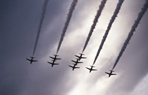 BAe Systems Hawks RAF Red Arrows perform under dark skies BAe Systems Hawks RAF Red Arrows perform under dark skies