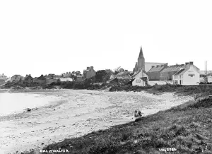 Prints of Ballywalter - a view of the town taken from the beach with children in the foreground. (Location: Northern Ireland; County Down; Ballywalter). Date: circa early 1900s Down Prints: Early 20th Century Ballywalter Print - A View from the Beach
