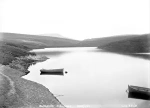 Prints of Banagher Reservoir, Dungiven - a view of the reservoir with two boats in the foreground. (Location: Northern Ireland; County Londonderry; Dungiven). Date: circa early 1900s Related Prints: Early 20th Century Print of Banagher Reservoir, Dungiven