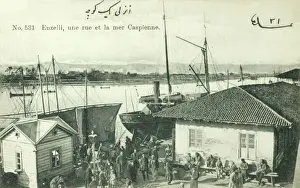 Prints of Bandar-e Anzali (Bandar-e Pahlavi) - a harbour town on the Caspian Sea, in the Iranian province of Gilan, close to Rasht, Iran. Harbour scene. Date: circa 1910 Related Prints: Bandar-e Anzali Harbour Scene Print, circa 1910