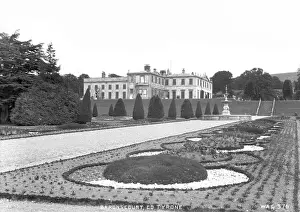 Prints of Baronscourt, Co Tyrone - a view of Baronscourt House from the formal garden. (Location: Northern Ireland: County Tyrone: Baronscourt). Date: circa early 1900s Tyrone Prints: Baronscourt House Print - Northern Ireland circa early 1900s