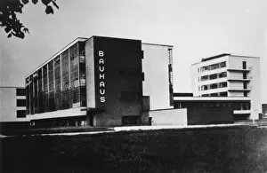 Prints of The Bauhaus building in Dessau, manufacturing city in eastern Germany. The building was built in 1925 - 26 by the German architect Walter Gropius. Date: 1930s Germany Prints: The Bauhaus Building Print, Dessau, 1925-26