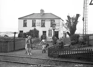 Prints of Belfast and County Down Railway. at Sydenham - a view of the station shop and people outside. (Location: Northern Ireland; County Down; Sydenham). Date: circa early 1900s Map Prints: Early 1900s Belfast Print: Sydenham Railway Station Scene