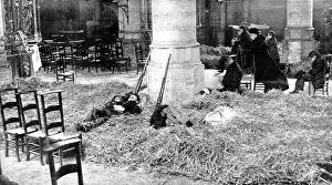 Belgian soldiers sleep in a church while women and civilians pray for their countrs Belgian soldiers sleep in a church while women and civilians pray for their countrs