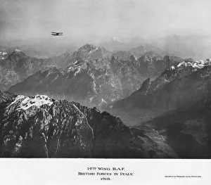 Biplane Flying over Snow-Covered Mountains 14th Wing Raf? Biplane Flying over Snow-Covered Mountains 14th Wing Raf?