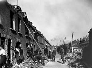 Blitz in London -- rescue workers in bombed street, WW2 Blitz in London -- rescue workers in bombed street, WW2