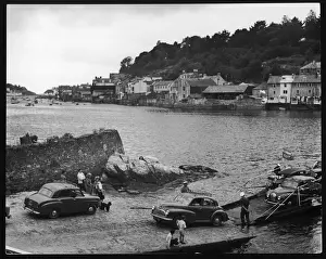 Prints of The Bodinnick Ferry, Fowey, Cornwall, which operates between the slipway at Bodinnick and Foweys Caffa Mill. The author Daphne du Maurier lived nearby Bodinnick Prints: Bodinnick Ferry Print, Cornwall