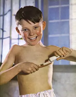 Vintage Toothpaste Advertisement Prints: A boy cleaning his teeth