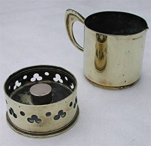 Brass jug made from 2 French 75 mm shell case bottoms Brass jug made from 2 French 75 mm shell case bottoms