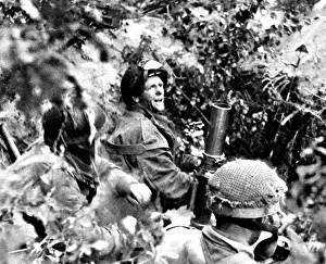 British First Airborne Troops using a mortar, Arnhem; Second British First Airborne Troops using a mortar, Arnhem; Second