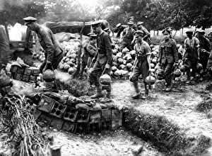 British soldiers carrying trench-mortar ammunition British soldiers carrying trench-mortar ammunition