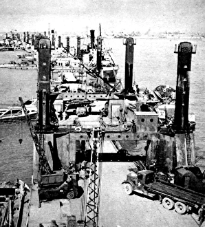 A Busy Wharf at Mulberry Harbour; Second World War, 1944 A Busy Wharf at Mulberry Harbour; Second World War, 1944