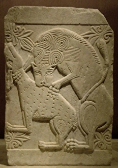 Byzantine relief. Marble slab with a lion devouring a deer Byzantine relief. Marble slab with a lion devouring a deer
