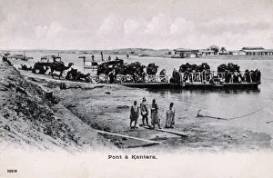 Camel train on a chain ferry at Kantara, Egypt Camel train on a chain ferry at Kantara, Egypt
