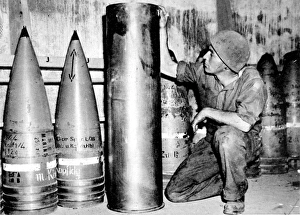 Canadian Gunner with German Munitions, France; Second World Canadian Gunner with German Munitions, France; Second World