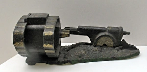 Cast Iron Starkies Patent Money Bank modelled as a cannon Cast Iron Starkies Patent Money Bank modelled as a cannon