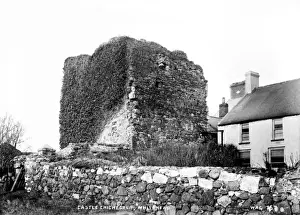 Prints of Castle Chichester, Whitehead - a view of a derelict castle with other buildings to the right. (Location: Northern Ireland: County Antrim: Whitehead). Date: circa early 1900s Castle Prints: Early 20th Century Print of Whitehead Castle Chichester