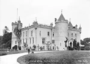 Prints of Castle Upton, Templepatrick - an oblique front view of the castle with two boys in the driveway. (Location: Northern Ireland: County Antrim: Templepatrick). Date: circa early 1900s Castle Prints: Castle Upton Print: Early 20th Century Oblique View
